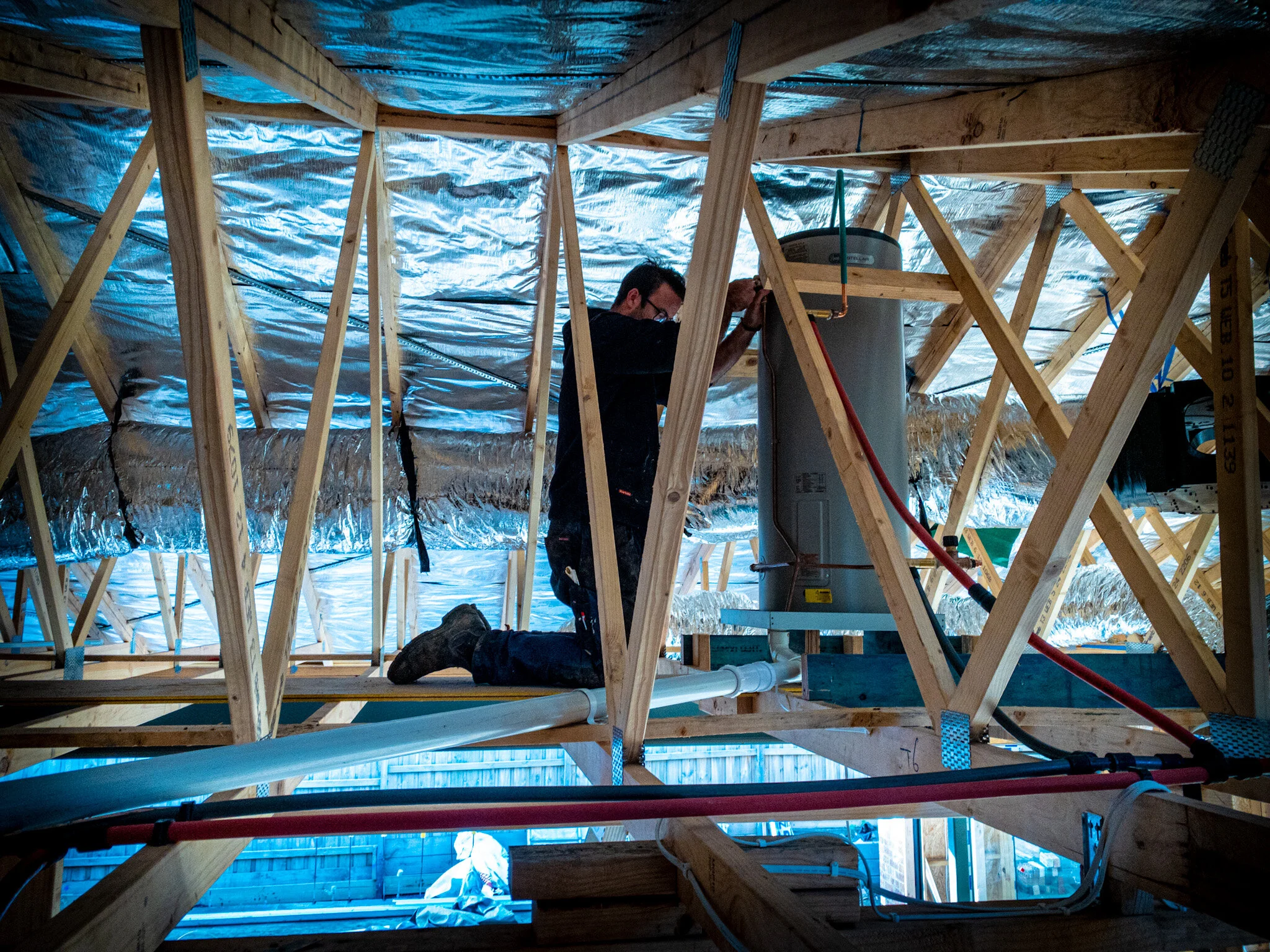 CLB Plumbing tradesperson at work in a Melbourne home
