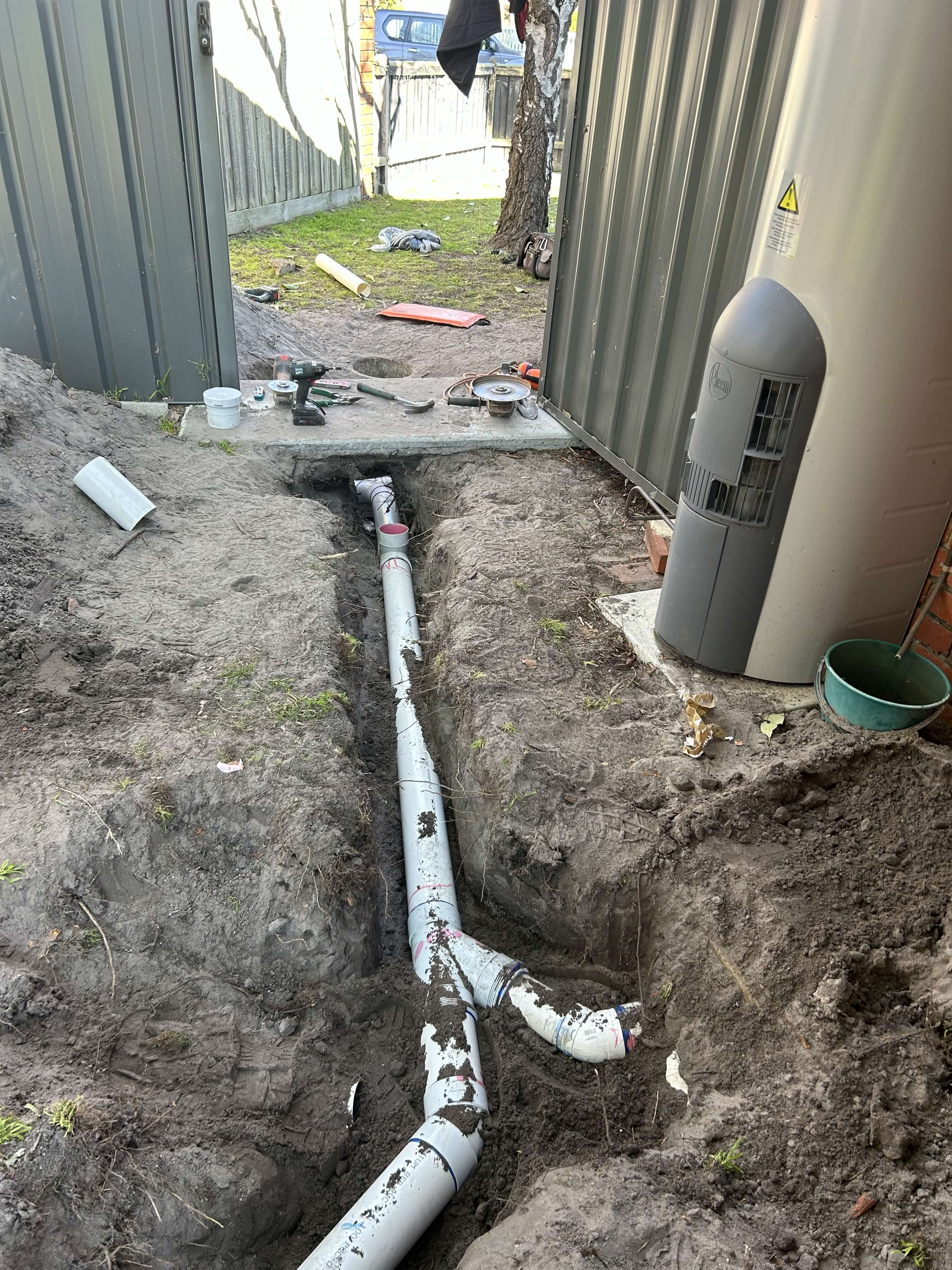 Drainage trench and hot water unit installation by CLB Plumbing